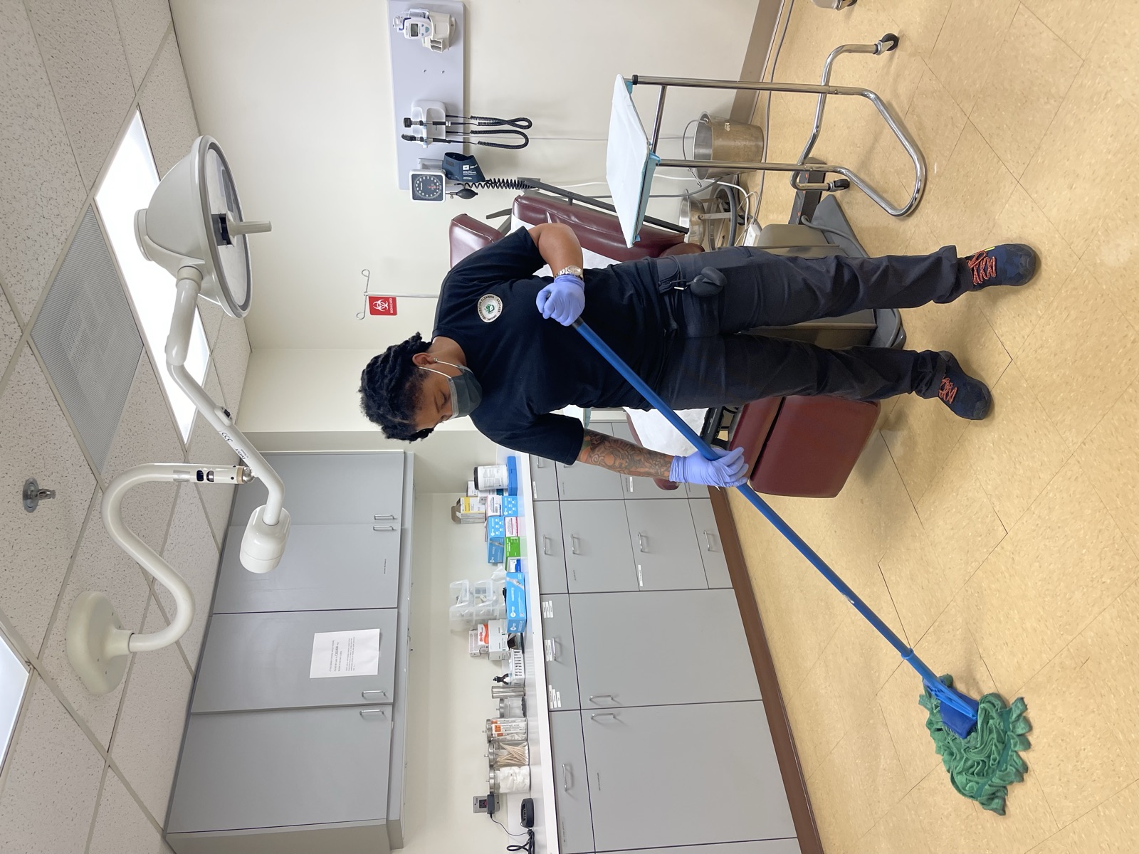 Organic Organization team member cleaning a medical facility